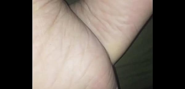  Her soles, and a lil leg.